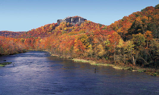 “Anglers fishing the Little Red River in Heber Springs, Arkansas, surrounded by vibrant fall foliage and rocky cliffs”