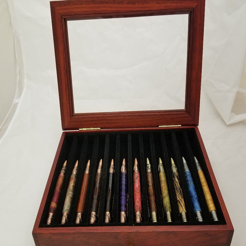 A collection of fishing rods in various colors neatly arranged inside a brown wooden case.